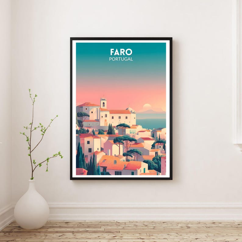 May include: A framed art print featuring a stylized illustration of Faro, Portugal. The artwork depicts white buildings with orange rooftops, green trees, and a teal and pink sky. The word "FARO" and "PORTUGAL" are printed at the top.