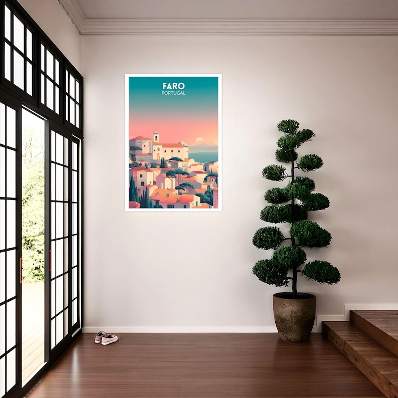 May include: A framed art print featuring a stylized illustration of Faro, Portugal. The artwork depicts a coastal town with white buildings, orange rooftops, and the text "FARO PORTUGAL" at the top against a teal and pink gradient background.