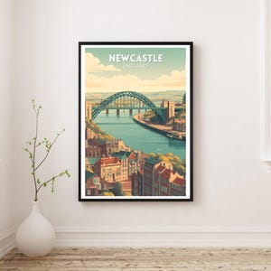 May include: A framed art print featuring a stylized illustration of Newcastle, England. The image showcases a teal-colored bridge spanning a river, with buildings and a cityscape in the foreground. The text "NEWCASTLE ENGLAND" is at the top.