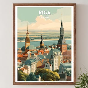 May include: A framed art print featuring a stylized illustration of Riga, Latvia. The artwork depicts a cityscape with tall spired buildings, red rooftops, and a river in the background. The print has a vintage travel poster aesthetic, with the city name at the top.