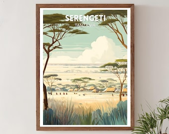 May include: A framed print featuring a stylized landscape of the Serengeti in Tanzania. The artwork depicts a savanna scene with acacia trees, huts, and figures, under a cloudy sky. The text "SERENGETI TANZANIA" is at the top.