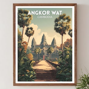 May include: A framed print featuring the Angkor Wat temple in Cambodia. The artwork depicts the temple complex with lush greenery and palm trees, under a blue sky. The text "ANGKOR WAT CAMBODIA" is displayed at the top.