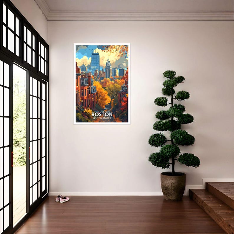 May include: A framed art print featuring a colorful illustration of Boston, Massachusetts. The artwork depicts a cityscape with autumn foliage and the text "BOSTON UNITED STATES" at the bottom. The print is displayed in a white frame.