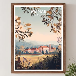 May include: Framed art print of Weimar, Germany, featuring a scenic illustration of a grand building with a red-tiled roof, set against a backdrop of rolling hills and a serene sky. The artwork is framed in a brown wooden frame, with the text "WEIMAR GERMANY" at the top.