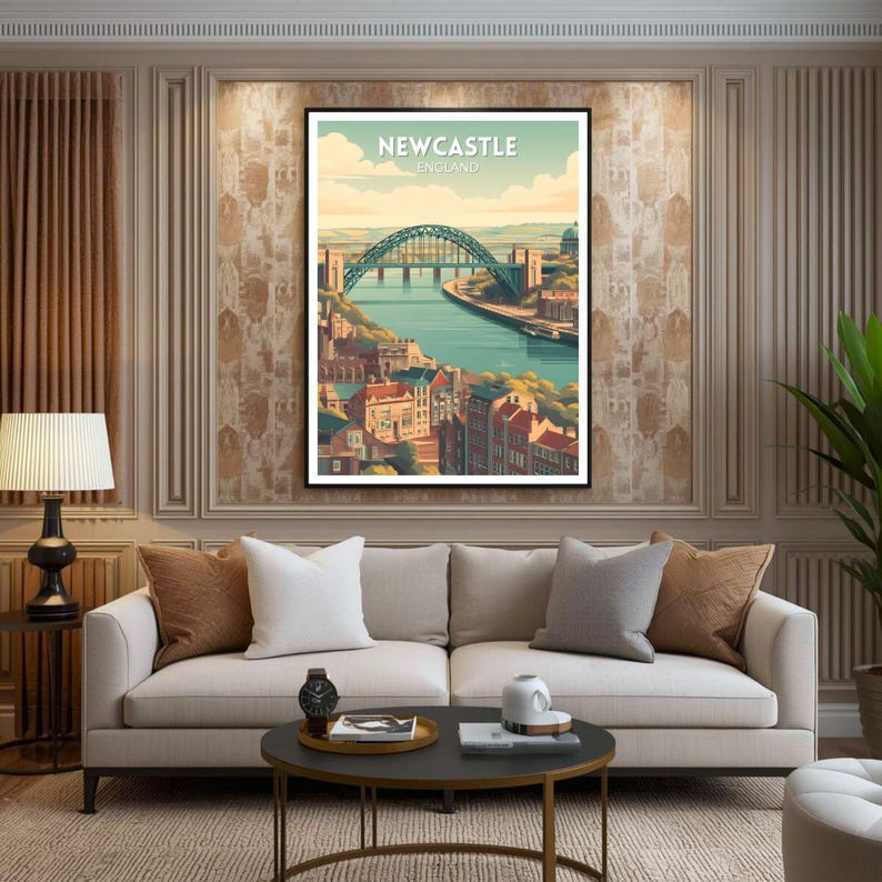 May include: A framed art print featuring a stylized illustration of Newcastle, England. The artwork depicts a green arch bridge over a river, with buildings and the text "Newcastle England" in a vintage style.