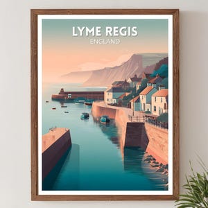 May include: A framed art print featuring a coastal scene of Lyme Regis, England. The artwork depicts a harbor with boats, buildings, and a cliffside, rendered in soft hues of blue, orange, and white. The text "LYME REGIS ENGLAND" is at the top.