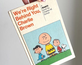Vintage Peanuts Book, “We're Right Behind You, Charlie Brown,” by Charles M. Schulz, A Peanuts Hardback Book 1964