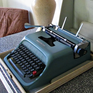 Vintage Portable Manual Typewriter with Lockable Case, Underwood Olivetti Studio 44, Case & Key, MCM Design Robin's Egg Blue, Made in Spain image 1