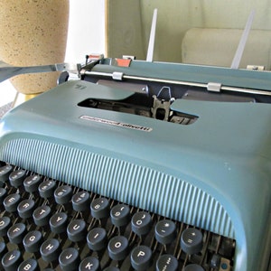Vintage Portable Manual Typewriter with Lockable Case, Underwood Olivetti Studio 44, Case & Key, MCM Design Robin's Egg Blue, Made in Spain image 2