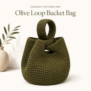 May include: Olive green crochet bucket bag with a loop handle. The bag is handmade and features a knotted detail where the handle meets the body. The text "Olive Loop Bucket Bag" and "Crochet Pattern PDF" are at the top.