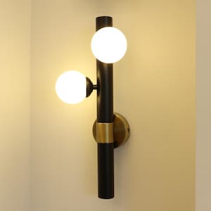 Modern Double Globe Wall Sconce – Handmade Black and Brass Wall Light – Vertical Art Deco Wall Lamp for Bedroom, Bathroom, Living Room