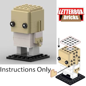 May include: A buildable figure made of tan and white plastic bricks on a black base, featuring two black circular eyes. The image includes a diagram showing assembly steps and the text "LETTERBOX bricks" and "Instructions Only".