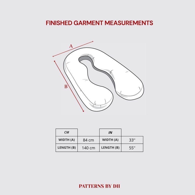 Peut inclure: Sch&eacute;ma d'un oreiller blanc en forme de U avec des mesures. La largeur est de 84 cm et la longueur de 140 cm. Le texte "FINISHED GARMENT MEASUREMENTS" et "PATTERNS BY DII" sont &eacute;galement visibles.