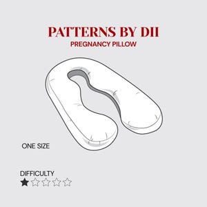 Puede incluir: Una almohada de embarazo blanca con diseño en forma de U. El texto "PATTERNS BY DII PREGNANCY PILLOW" está en la parte superior. El texto "ONE SIZE" está debajo de la almohada. La dificultad se indica con una estrella.