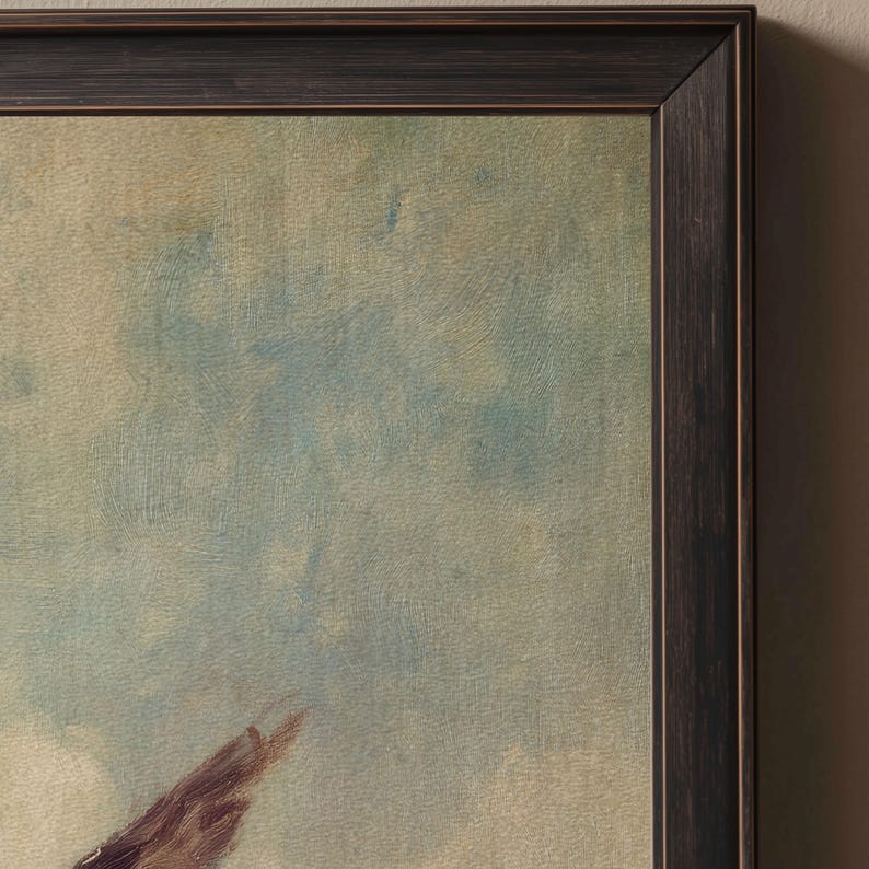 May include: A framed painting in a dark brown wooden frame. The artwork uses a soft, impressionistic style with a blend of blue, white, and brown hues. The brushstrokes create a textured effect, evoking a sense of depth and movement.