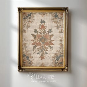 May include: A framed vintage-inspired art print with a floral design in shades of brown, orange, and blue. The print is set within a gold-colored ornate frame. The text "Ella & Fitz Vintage Inspired Art Prints" is at the bottom.