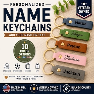 May include: Five rectangular leather keychains with gold-tone metal rings and rivets, each engraved with a unique name: Hattie, Harper, Peyton, Madison, and Jackson. The keychains are displayed in blue, green, brown, pink, and gray colors.