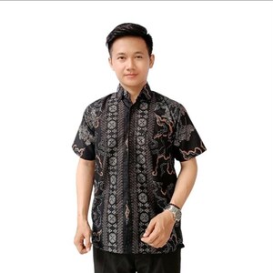 May include: A black short-sleeved shirt with a patterned design. The shirt has a repeating pattern of vertical stripes and floral motifs in grey and red. The shirt is worn by a person.