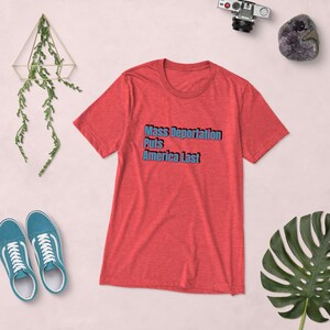 Mass Deportation Puts America Last Shirt – Patriotic Pro-Immigration Tee – Red & Blue Political Shirt – Unisex USA Activist T-Shirt