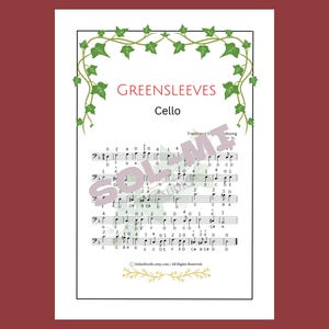 May include: A sheet music page for cello titled Greensleeves, featuring a black musical staff with notes and finger numbers. The border is decorated with green ivy vines at the top and a gold floral flourish at the bottom on a white background.