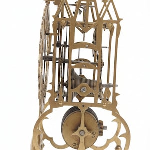 May include: A brass lantern clock movement featuring an exposed gear train, a circular dial plate, and a top-mounted bell. The structure is supported by an ornate, arched base with four small feet, showcasing intricate metalwork and mechanical parts.