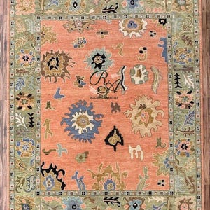 Hand-Knotted Oushak Wool Rug: Rust Orange, Green Border, Turkish Tribal Carpet 6x9