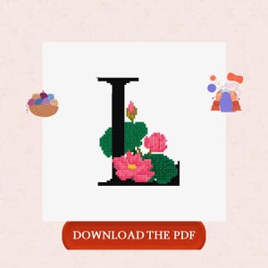 May include: A cross-stitch design featuring the letter "L" in black, adorned with pink flowers and green leaves. The image includes a button that says "DOWNLOAD THE PDF". The design is set against a white background, with illustrations of yarn and knitting.