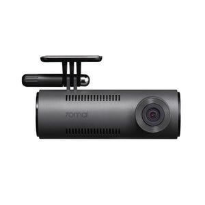 May include: A dark gray cylindrical dash camera featuring the 70mai logo on the front, a circular lens on the right side, and a black mounting bracket with an adjustable arm attached to the top for secure installation in a vehicle.