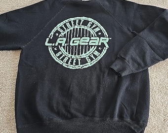 Vintage L.A. Gear Street Gym sweater met ronde hals zwart met teal-spellout Maattabel