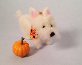 Westie figurine with miniature pumpkin