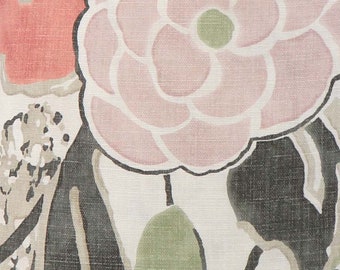May include: A white fabric with a floral pattern. The flowers are pink, red, and green. The fabric has a textured surface.