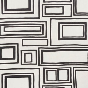 May include: Abstract black and white geometric pattern with overlapping squares and rectangles.