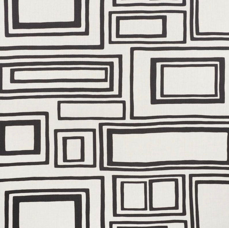 May include: Abstract black and white geometric pattern with overlapping squares and rectangles.