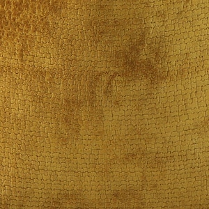 May include: A close-up of a textured fabric with a golden yellow color.