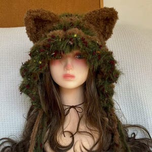 Handmade moss green cat ear hat with brown embellishments, plush knitted woodland hat, forest fairy cosplay fox ear hat scarf, unique gift