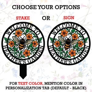 May include: Two circular black metal garden signs featuring a central bee surrounded by orange flowers and green leaves. The text reads "WELCOME TO HEATHER'S GARDEN". One version includes a pointed stake at the bottom, while the other is a flat sign.