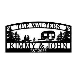 May include: Black metal sign with the text "THE WALTERS" and "KIMMY & JOHN EST.2025". The design includes silhouettes of a couple, a camper, trees, and a campfire, ideal for a camping theme.