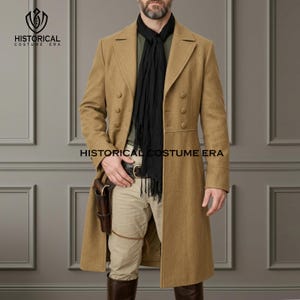 May include: A tan wool coat with a double-breasted design, worn with a black scarf and khaki pants. The coat features multiple buttons and a classic lapel. A leather holster is attached to the pants. The text "HISTORICAL COSTUME ERA" is visible.
