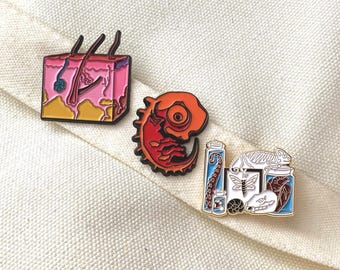 1 SCIENCE BIOLOGY CELL enamel pin | skin diagram | cellular organism | stem medicine research scientist | specimen | embryo