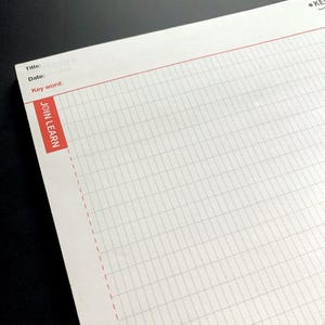 May include: A white grid-lined notepad with red accents. The notepad has a red border at the top and a red rectangular label that reads "JOIN LEARN". The notepad has spaces for "Title", "Date", and "Key word".
