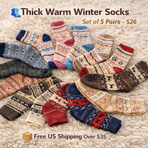 May include: A white ceramic mug with a black handle and the text "But First, Coffee" in a black, handwritten-style font. The mug is on a white surface.