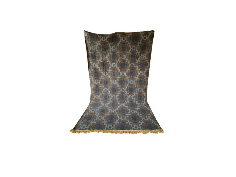 Handwoven wool kilim rug in brown and blue geometric tribal pattern; flatweave, boho living room or bedroom rug.