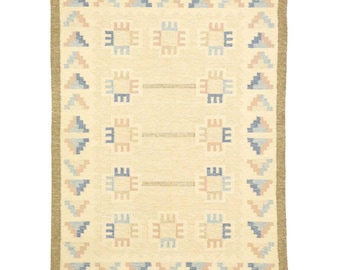 Alfombra Kilim de lana tejida a mano: Alfombra bohemia geométrica beige y azul