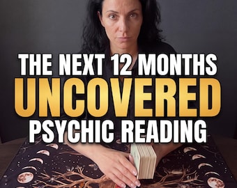 May include: A deck of tarot cards held on a black cloth featuring a moon phase border and a central tree illustration. The text reads THE NEXT 12 MONTHS UNCOVERED PSYCHIC READING. The cards are rectangular with white edges and a light-colored back design.
