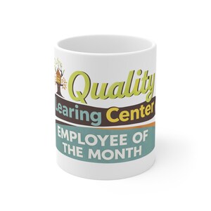 May include: White ceramic mug with the words "Quality Learning Center" in green and brown, and "EMPLOYEE OF THE MONTH" in teal. A treehouse graphic is on the left side of the mug.