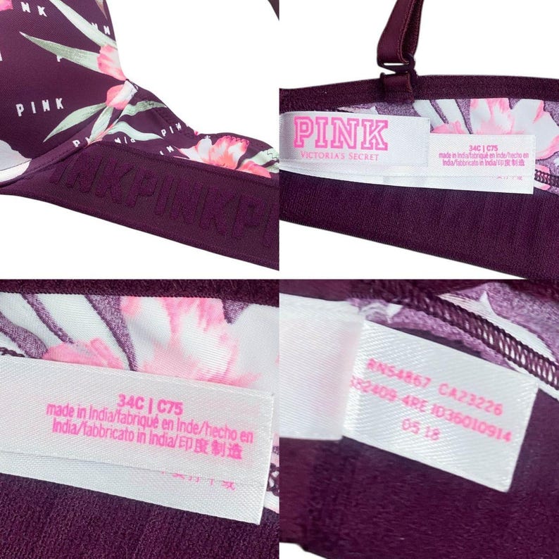 Puede incluir: Sujetador granate con estampado floral en rosa y blanco. El sujetador tiene la palabra "PINK" impresa en la banda y la etiqueta "PINK VICTORIA'S SECRET". La talla del sujetador es 34C/C75.