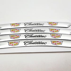 4 pegatinas plateadas de 9 cm para llantas de Cadillac. Elegante adhesivo para tapacubos de coche.