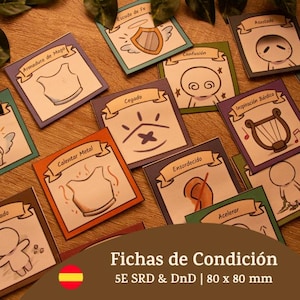 以下が含まれることがあります： テーブルトークRPG用の、イラスト入りのコンディションカードのコレクション。各カードには、ユニークなアイコンとスペイン語のテキスト（「Armadura de Mago」や「Escudo de Fe」など）が記載されています。カードのサイズは約8 x 8 cmです。