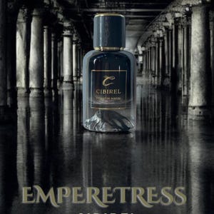 May include: A clear glass perfume bottle with a dark, textured cylindrical cap. The label features a gold logo, the text CIBIREL, and the words EXTRAIT DE PARFUM. The bottle has a dark, liquid-filled base and sits against a dark, reflective background.