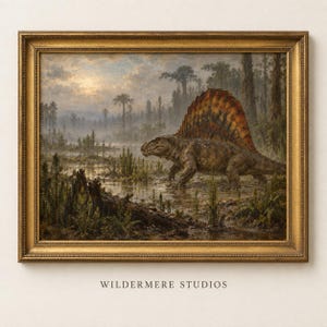 May include: A framed landscape painting depicting a Dimetrodon with a large dorsal sail standing in a prehistoric swampy environment with tall trees and a misty sky. The artwork is enclosed in a gold-toned frame with the text WILDERMERE STUDIOS below.
